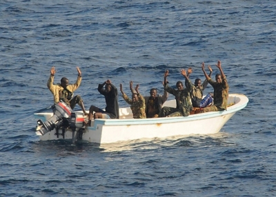 File photo: Somali pirates surrender at sea when a US Navy ship approaches them, February 11, 2009 (Jason R. Zalasky, US Navy) 